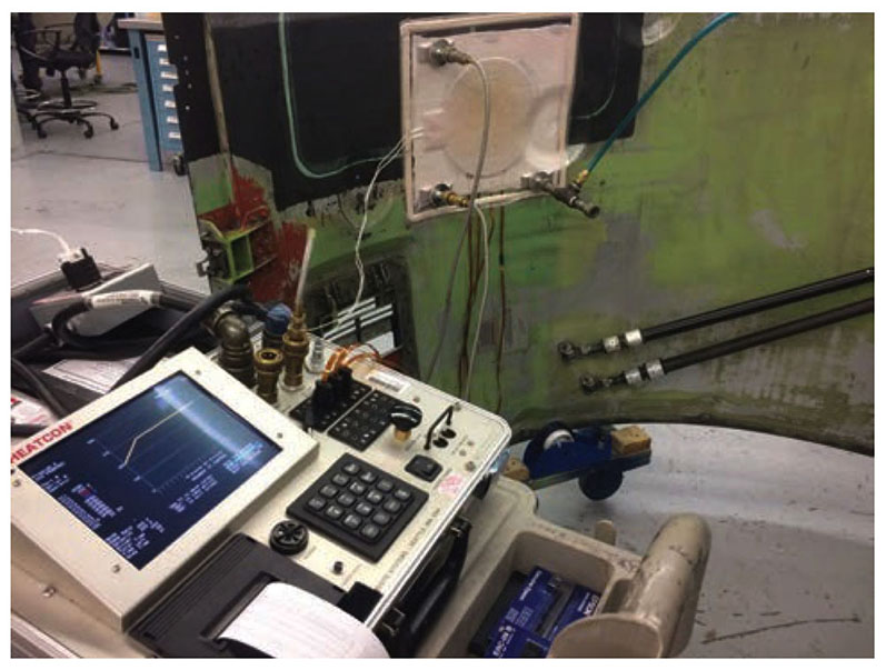 Figure 6. Out-of-autoclave curing setup with automatic control for composite structure repair. (Source: Georgia Institute of Technology)