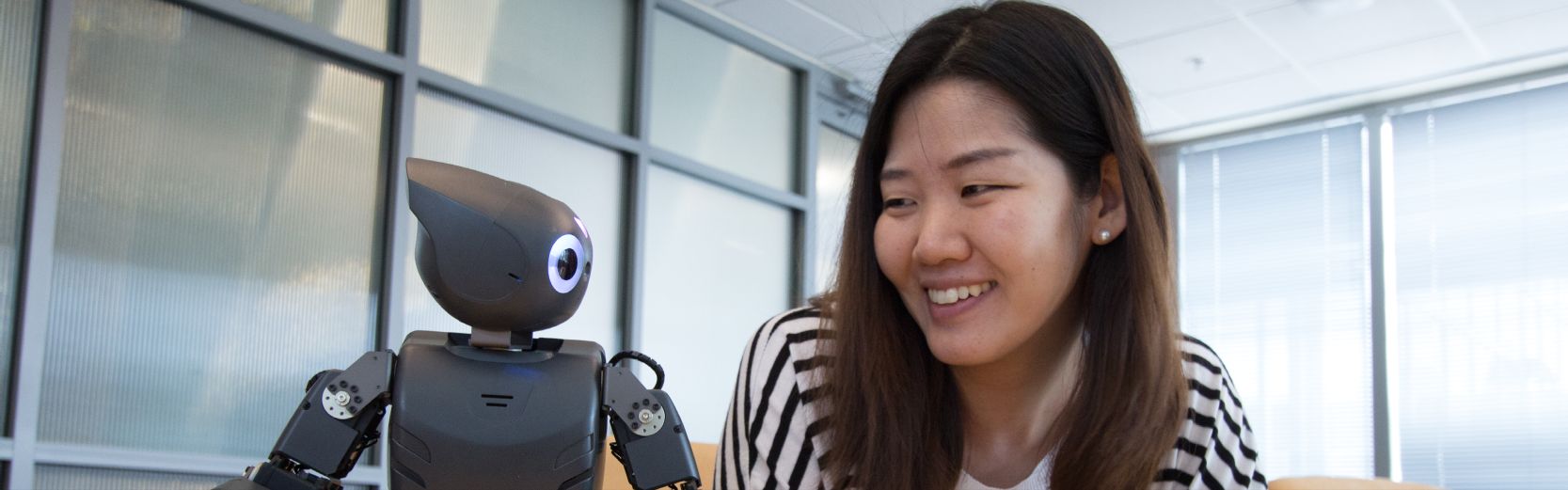 Woman with an Interactive Robot