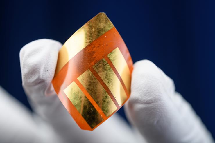 <p>Perovskite-based solar cells are flexible, lightweight, can be produced cheaply and could someday bring down the cost of solar energy. (Credit: Rob Felt)</p>