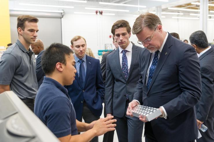 <p>Toni Cvitanic (left) at Georgia Tech with Boeing executives</p>