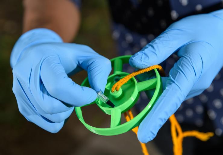 <p>A sample vial is placed into the disk of a 3D-Fuge for separation. (Photo: Rob Felt, Georgia Tech)</p><p> </p>