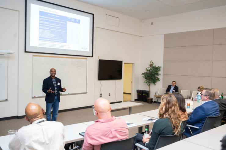 <p>George White presenting to all AMPF open house industry attendees</p>