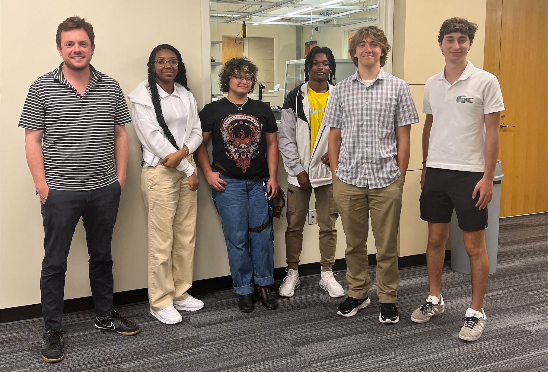 Students arrive at Georgia Tech accompanied by Nathan Williams (left), a Dekalb County school teacher.