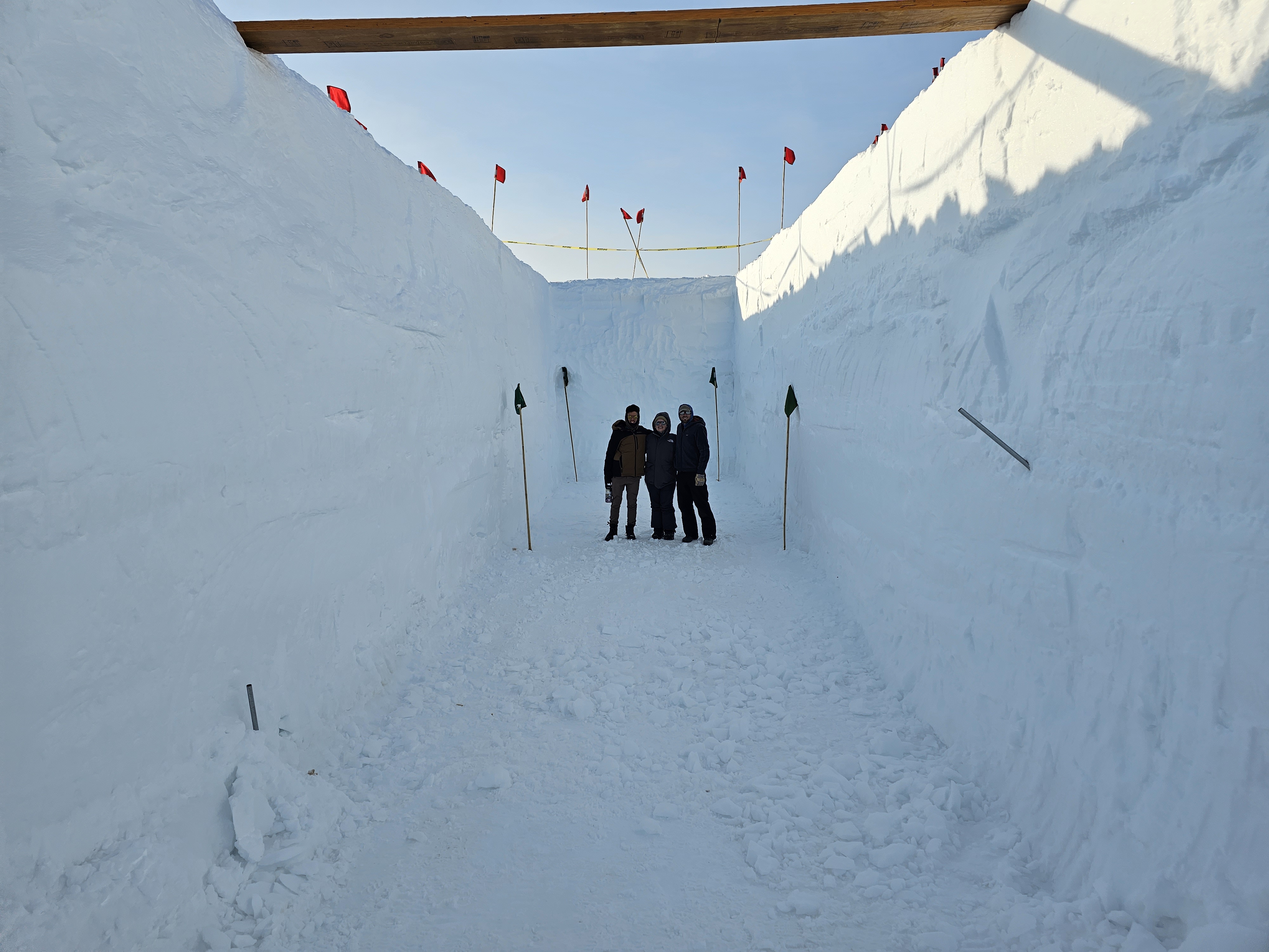 The team standing in the research trench.