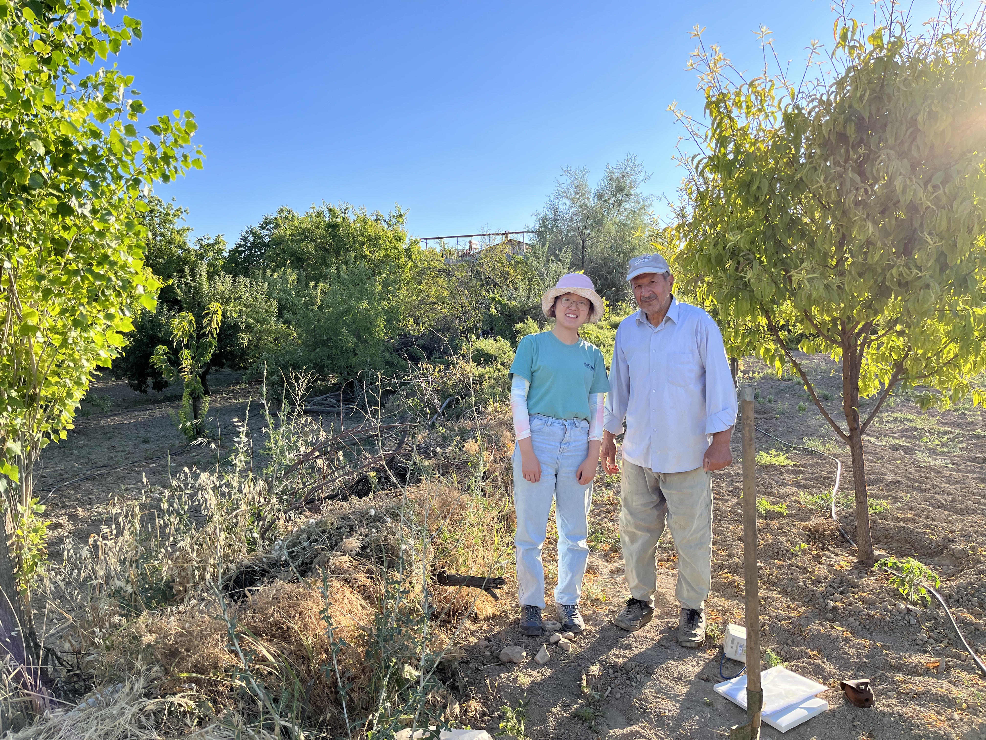 Georgia Tech graduate student Chang Ding posing with a local villager at a seismic site in Southern Turkey