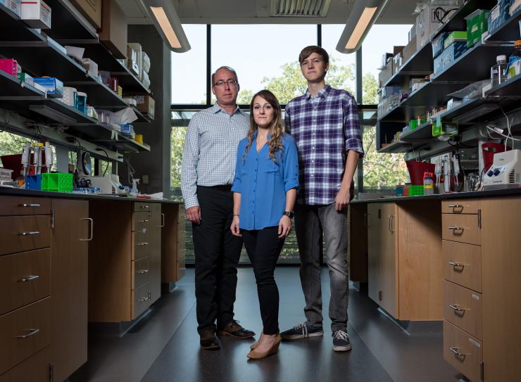 <p>From left to right: Eric Gaucher, Ryan Randall and Caelan Radford in Gaucher's lab at the Georgia Institute of Technology.</p><p>Credit: Georgia Tech / Rob Felt</p>