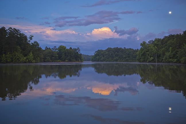 <p>Using data gathered from Wisconsin’s Lake Mendota, researchers have developed what is believed to be largest dynamic model of microbial species interactions ever created. The technique is now being applied to Lake Lanier, a reservoir located north of Atlanta, which is shown here. (Credit: Georgia Department of Economic Development).</p>