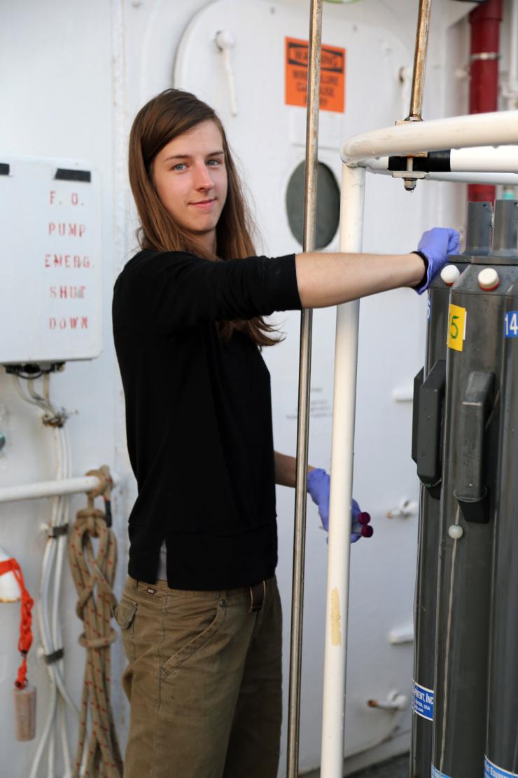 <p>Sarah Weber – then a technician and master’s degree student, now a Ph.D. student at the University of Rostock in Germany – draws samples from the CTD-rosette. (Credit: Joe Montoya, Georgia Tech)    </p>