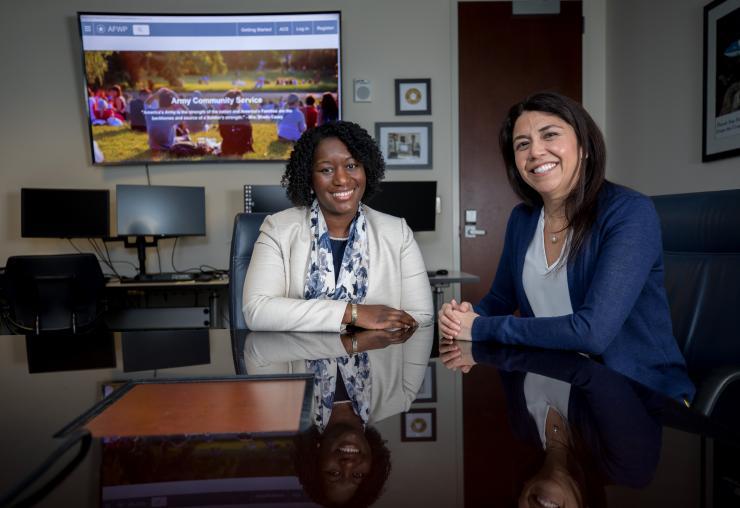 <p>GTRI Senior Research Scientist Sheila Isbell and Senior Research Associate Margarita Gonzalez are helping the Army Community Service program revamp information systems used to provide an array of social services to the families of soldiers. (Credit: Branden Camp, Georgia Tech)</p>