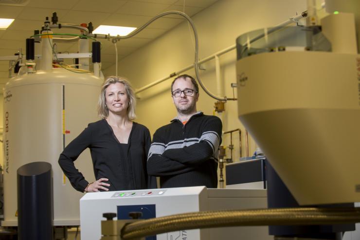 <p>Principal investigator Julia Kubanek with graduate researcher Serge Lavoie at the Georgia Tech Nuclear Magnetic Resonance Center. Credit: Georgia Tech / Christopher Moore</p>