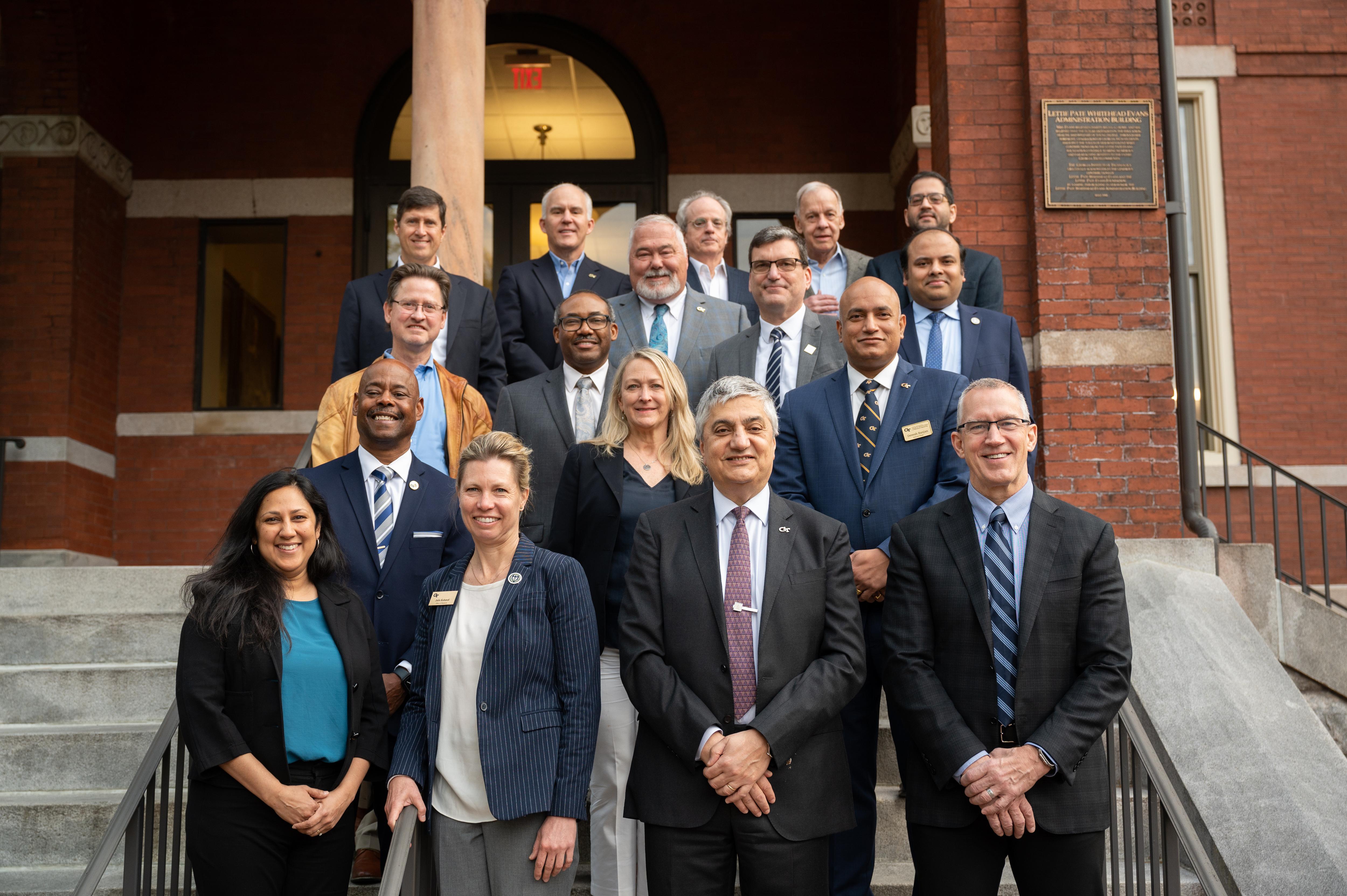 Group of faculty leaders in front of Tech Tower