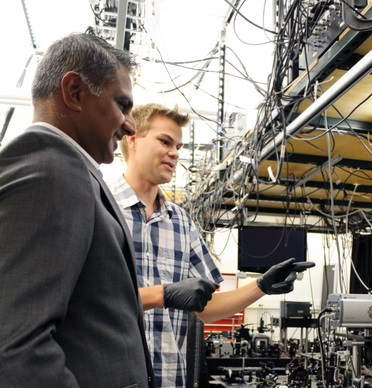 <p>Chandra Raman with a Student in his Research Lab</p>