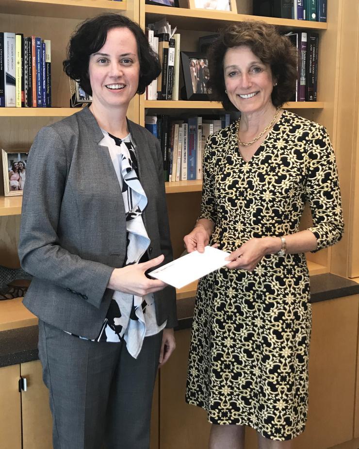 <p>Johnna Temenoff receives Carol Ann and David D. Flanagan endowed professorship from Susan Margulies, BME chair.</p>