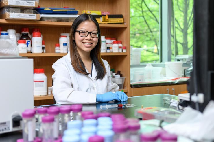 <p>Researchers have developed a potentially new way to introduce macromolecules and therapeutic genes into human cells. Shown is National Science Foundation Graduate Research Fellow Anna Liu. (Credit: Rob Felt, Georgia Tech)</p>