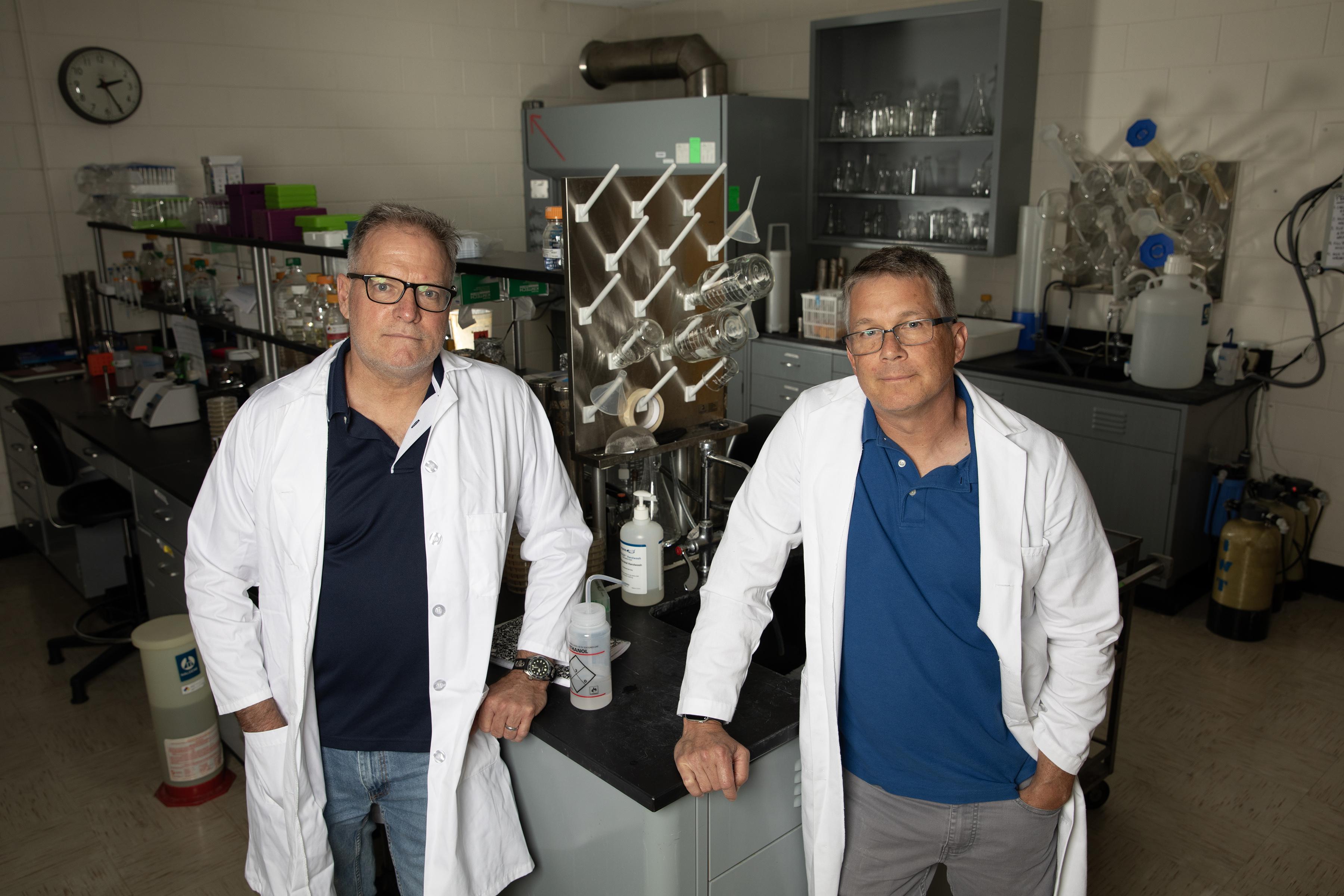 Researchers Michael Farrell (left) and Brian Hammer are working on a potential new way to boost the effectiveness of influenza vaccines. (Credit: Sean McNeil)