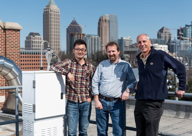 <p>Georgia Tech researchers have found that the pH of atmospheric sulfate particles is lower than expected. Shown (l-r) are Georgia Tech graduate student Hongyu Guo, Professor Rodney Weber from the School of Earth &amp; Atmospheric Sciences and Professor Armistead Russell from the School of Civil and Environmental Engineering. (Credit: Rob Felt, Georgia Tech)</p>